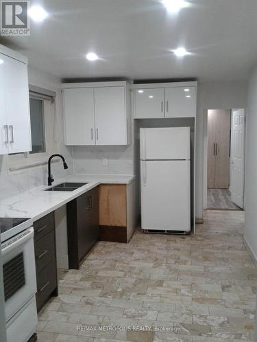 65 Elnathan Crescent, Toronto, ON - Indoor Photo Showing Kitchen With Double Sink