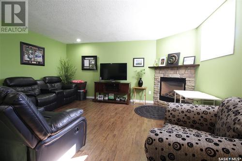 212 Qu'Appelle Street, Welwyn, SK - Indoor Photo Showing Living Room With Fireplace