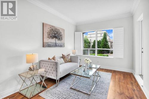 201 - 2 Clairtrell Rd Road, Toronto, ON - Indoor Photo Showing Living Room