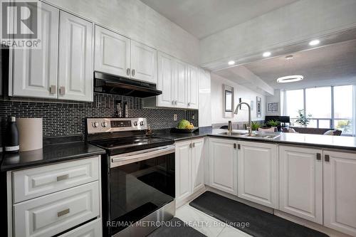 1011 - 410 Mclevin Avenue, Toronto, ON - Indoor Photo Showing Kitchen With Double Sink