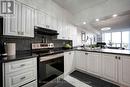 1011 - 410 Mclevin Avenue, Toronto, ON  - Indoor Photo Showing Kitchen With Double Sink 