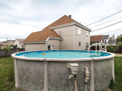 Pool - 14 Rue Adélard-Perreault, Mercier, QC - Outdoor With Above Ground Pool