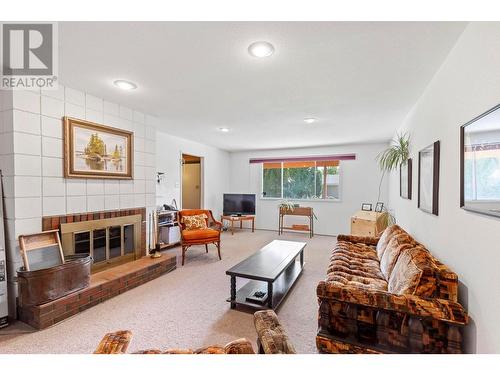 7 Caramillo Road, Kelowna, BC - Indoor Photo Showing Living Room With Fireplace