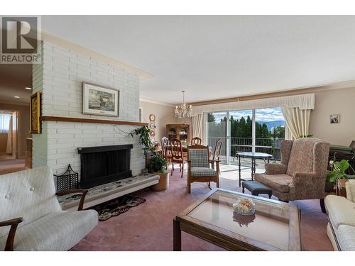 7 Caramillo Road, Kelowna, BC - Indoor Photo Showing Living Room With Fireplace