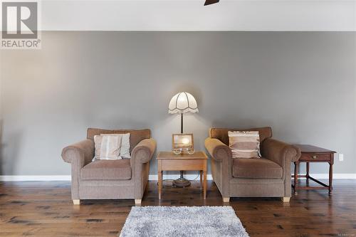 Living area with dark hardwood / wood-style floors - 773 Terrien Way, Parksville, BC - Indoor Photo Showing Other Room