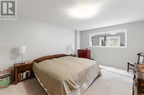 View of carpeted bedroom - 773 Terrien Way, Parksville, BC - Indoor Photo Showing Bedroom