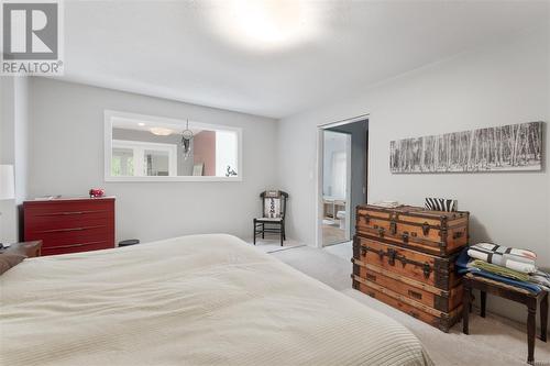 Bedroom featuring light colored carpet - 773 Terrien Way, Parksville, BC - Indoor Photo Showing Bedroom