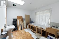 Bathroom with a skylight and sink - 