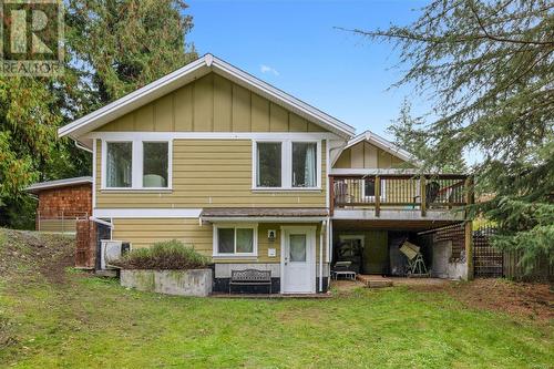 Rear view of property with a deck and a lawn - 773 Terrien Way, Parksville, BC - Outdoor