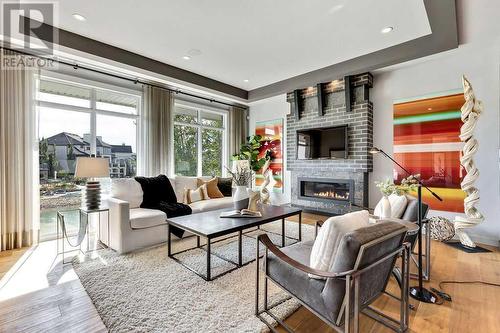 111 Mahogany Bay Se, Calgary, AB - Indoor Photo Showing Living Room With Fireplace