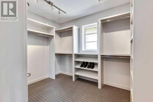 Primary Walk In Closet - 111 Mahogany Bay Se, Calgary, AB - Indoor With Storage