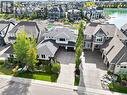 111 Mahogany Bay Se, Calgary, AB  - Outdoor With Body Of Water With Facade 