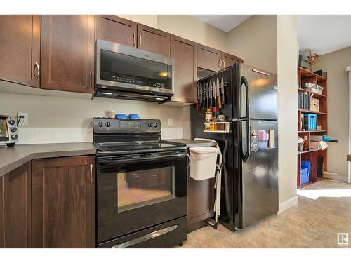 #8 13825 155 Av Nw, Edmonton, AB - Indoor Photo Showing Kitchen