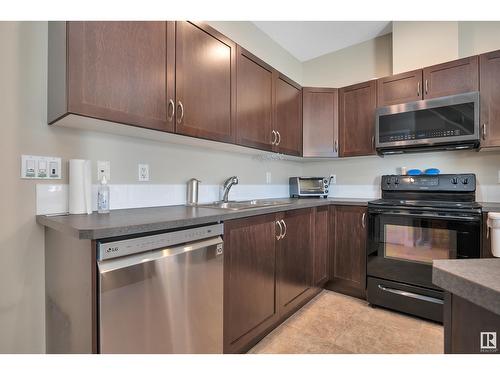 #8 13825 155 Av Nw, Edmonton, AB - Indoor Photo Showing Kitchen