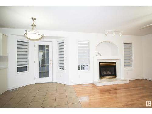 510 Kulawy Pt Nw Nw, Edmonton, AB - Indoor Photo Showing Living Room With Fireplace