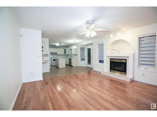 510 Kulawy Pt Nw Nw, Edmonton, AB - Indoor Photo Showing Living Room With Fireplace