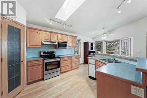 181 Hamptons Green Nw, Calgary, AB - Indoor Photo Showing Kitchen With Stainless Steel Kitchen With Double Sink