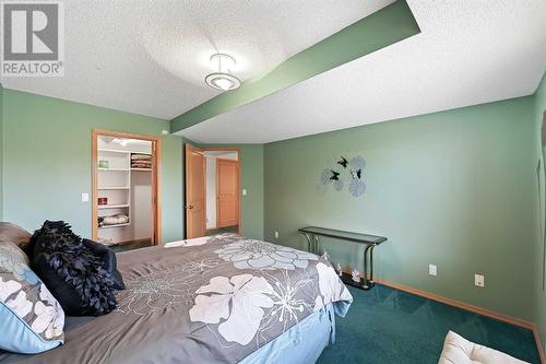 181 Hamptons Green Nw, Calgary, AB - Indoor Photo Showing Bedroom