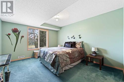 181 Hamptons Green Nw, Calgary, AB - Indoor Photo Showing Bedroom