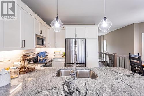 15 Tattersall Lane, Lambton Shores (Grand Bend), ON - Indoor Photo Showing Kitchen With Upgraded Kitchen