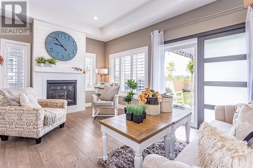 15 Tattersall Lane, Lambton Shores (Grand Bend), ON - Indoor Photo Showing Living Room With Fireplace