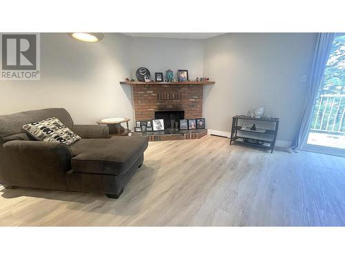 116 Gull Crescent, Prince Rupert, BC - Indoor Photo Showing Living Room With Fireplace