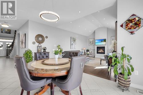 71 Riley Crescent, Centre Wellington, ON - Indoor Photo Showing Dining Room With Fireplace