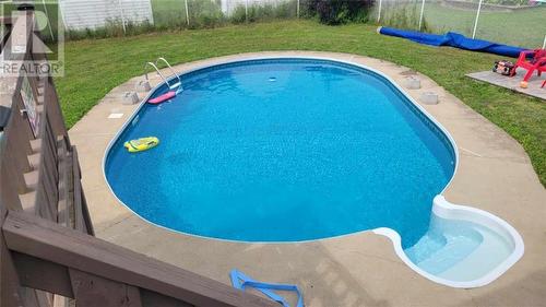 44 Elsie Crescent, Moncton, NB - Outdoor With In Ground Pool With Backyard