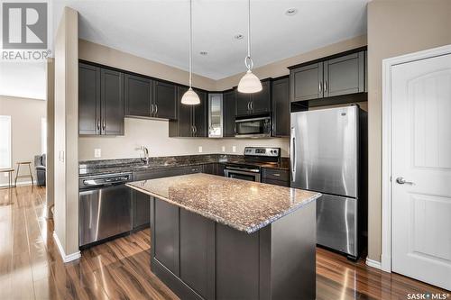 344 Willowgrove Lane, Saskatoon, SK - Indoor Photo Showing Kitchen With Stainless Steel Kitchen With Double Sink With Upgraded Kitchen