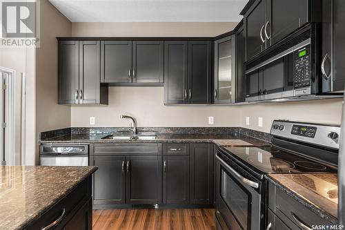 344 Willowgrove Lane, Saskatoon, SK - Indoor Photo Showing Kitchen With Double Sink