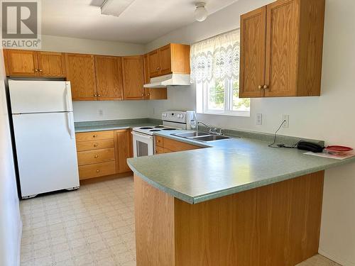 7140 4Th Street Unit# 309, Grand Forks, BC - Indoor Photo Showing Kitchen With Double Sink