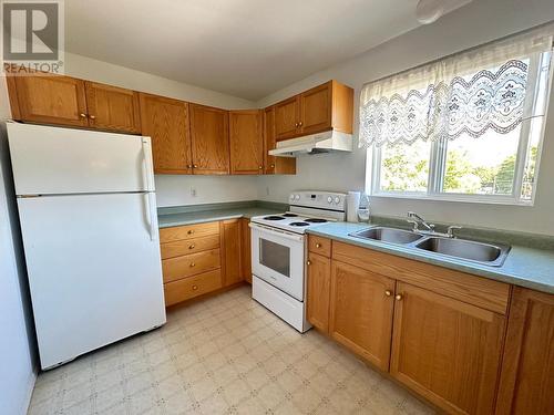 7140 4Th Street Unit# 309, Grand Forks, BC - Indoor Photo Showing Kitchen With Double Sink