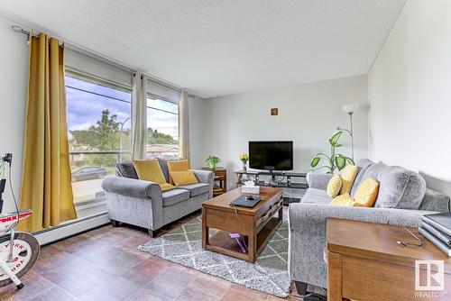 10315 120 Av Nw, Edmonton, AB - Indoor Photo Showing Living Room