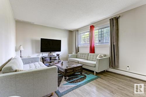 10315 120 Av Nw, Edmonton, AB - Indoor Photo Showing Living Room