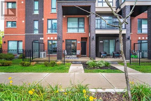 97 - 100 Dufay Road, Brampton, ON - Outdoor With Facade