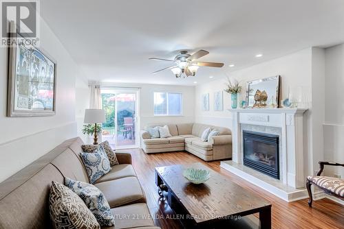 14 Manvers Drive, Kawartha Lakes, ON - Indoor Photo Showing Living Room With Fireplace