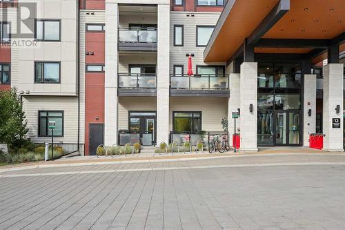 103, 12 Mahogany Path Se, Calgary, AB - Outdoor With Balcony With Facade