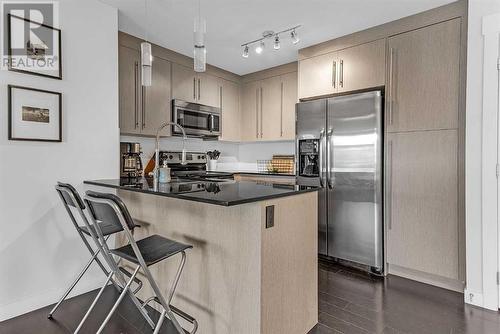 2417, 11 Mahogany Row Se, Calgary, AB - Indoor Photo Showing Kitchen With Stainless Steel Kitchen