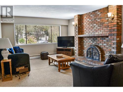 2944 E 4Th Avenue, Vancouver, BC - Indoor Photo Showing Living Room With Fireplace