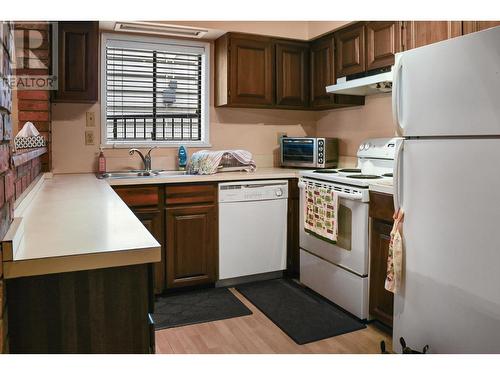 2944 E 4Th Avenue, Vancouver, BC - Indoor Photo Showing Kitchen With Double Sink