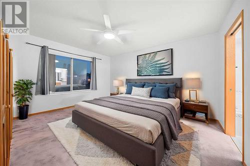 Primary Bedroom (Virtually Staged) - 86 Cranfield Crescent Se, Calgary, AB - Indoor Photo Showing Bedroom