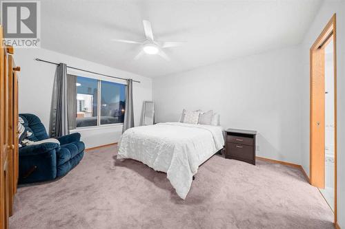 Primary Bedroom - 86 Cranfield Crescent Se, Calgary, AB - Indoor Photo Showing Bedroom