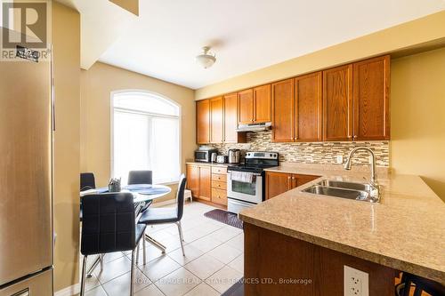 36 - 6625 Falconer Drive, Mississauga, ON - Indoor Photo Showing Kitchen With Double Sink