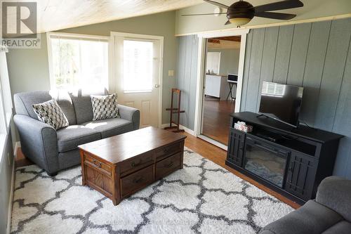 Lt7C5 Highway 65, Timiskaming Remote Area, ON - Indoor Photo Showing Living Room With Fireplace