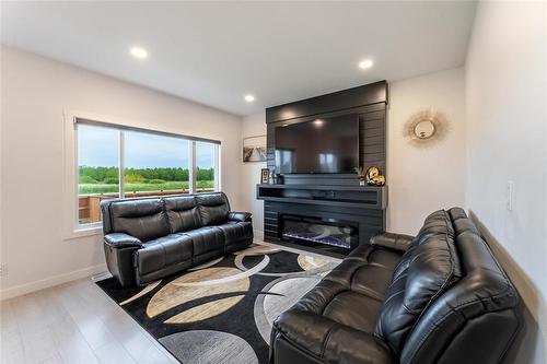 134 Orion Crescent, Winnipeg, MB - Indoor Photo Showing Living Room With Fireplace