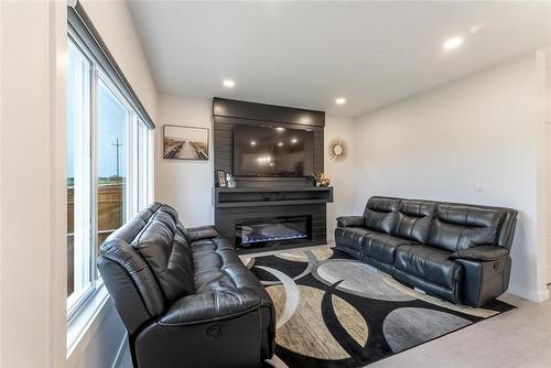 134 Orion Crescent, Winnipeg, MB - Indoor Photo Showing Living Room With Fireplace