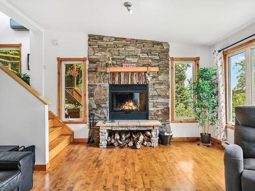 Living room - 628 Ch. Huntington, Bromont, QC - Indoor Photo Showing Living Room With Fireplace