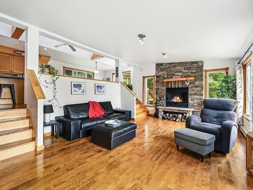 Living room - 628 Ch. Huntington, Bromont, QC - Indoor Photo Showing Living Room With Fireplace