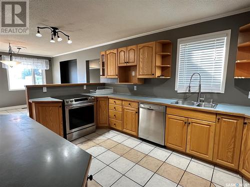 761 Powley Street, Swift Current, SK - Indoor Photo Showing Kitchen With Double Sink