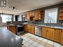 761 Powley Street, Swift Current, SK  - Indoor Photo Showing Kitchen With Double Sink 